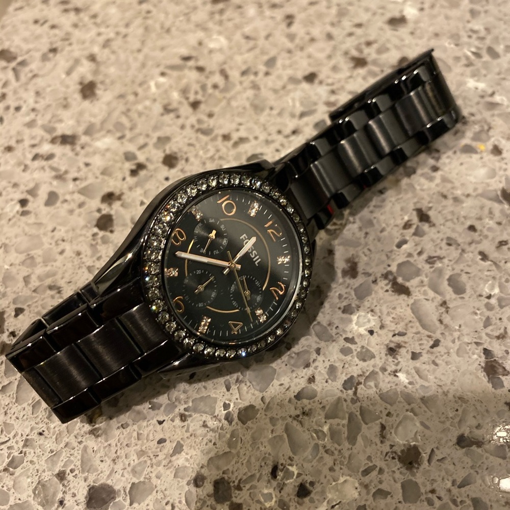 Black and Rose gold Fossil watch.